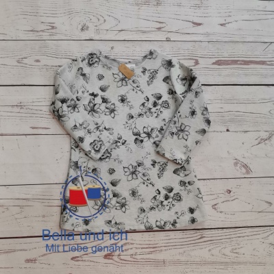 Handgemachte Mädchentunika mit Blumen